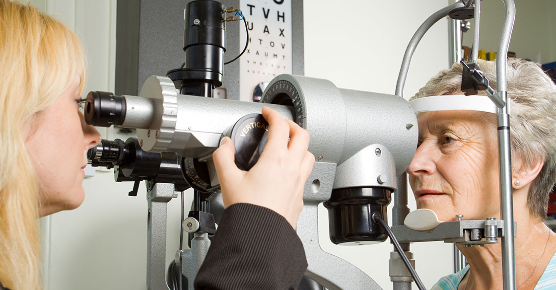 Older woman having her routine eye exam