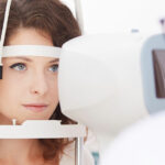 Woman examined for the early signs of astigmatism