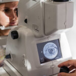 woman having her eye examined for a vision impairment