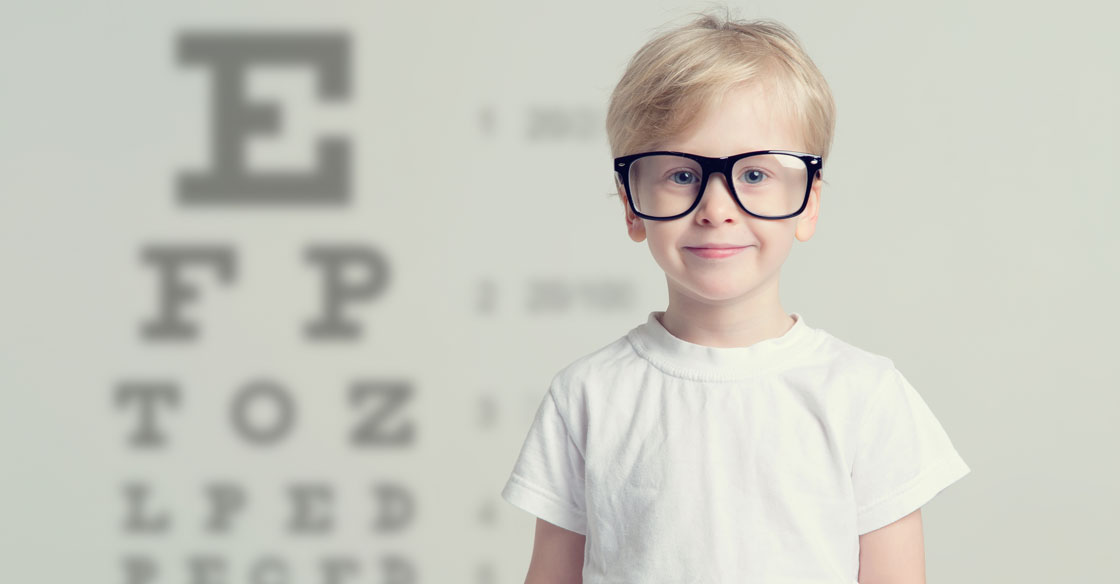 Vision Problems - Young Boy wearing glasses to big for his face