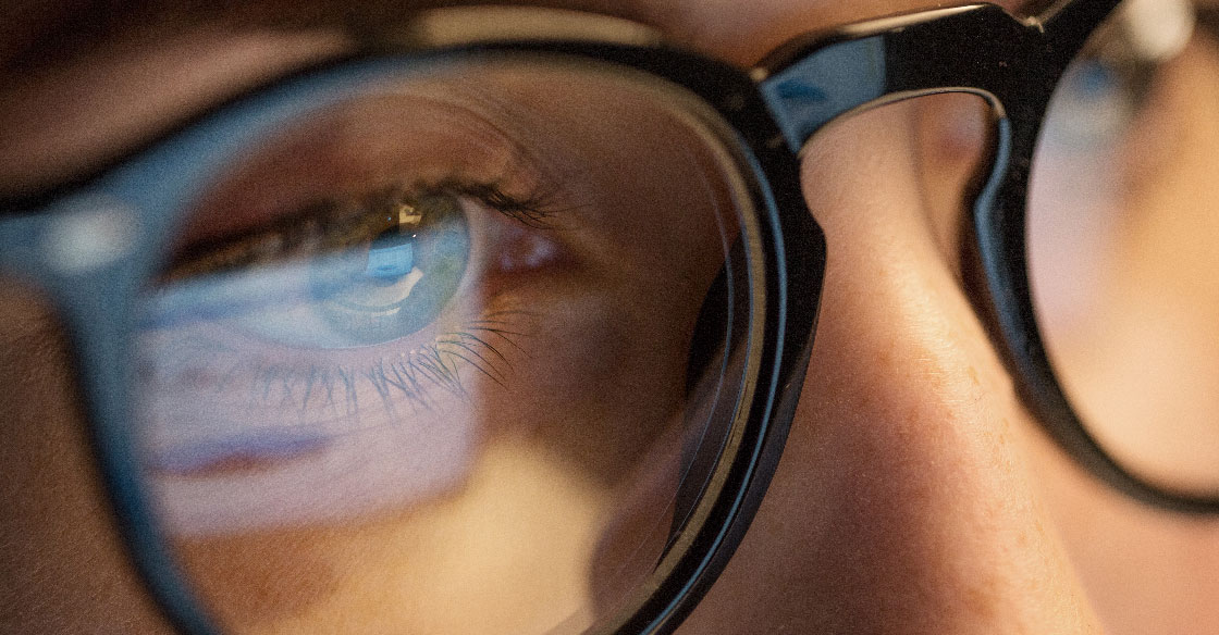 Closeup of an eye and glasses