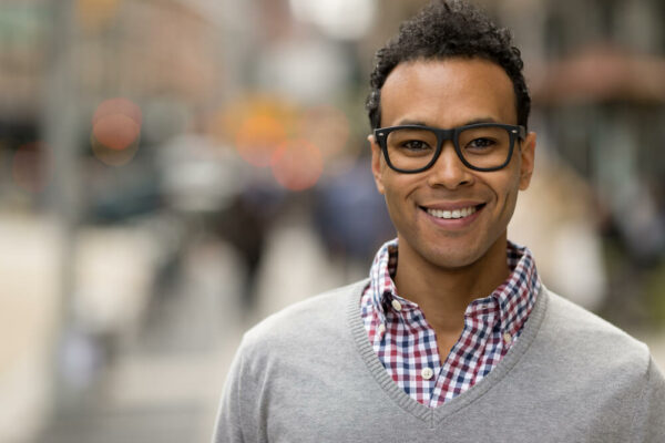 Handsome young man wearing glasses.