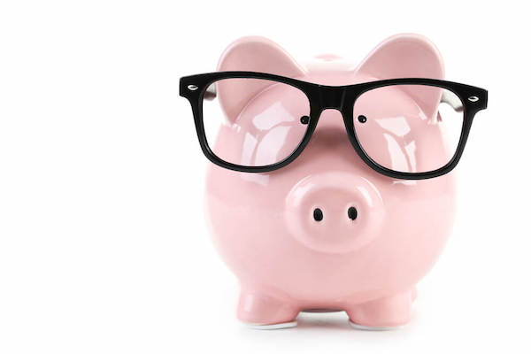 Pink piggy bank wearing black glasses
