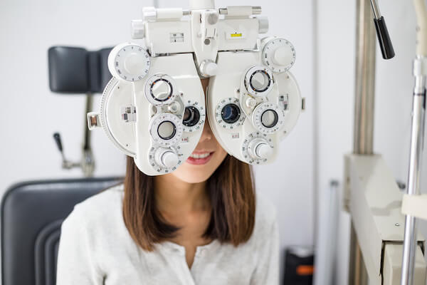 Woman getting an eye exam