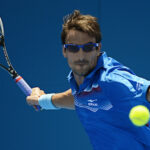 Sports Eyeglasses - Man playing tennis