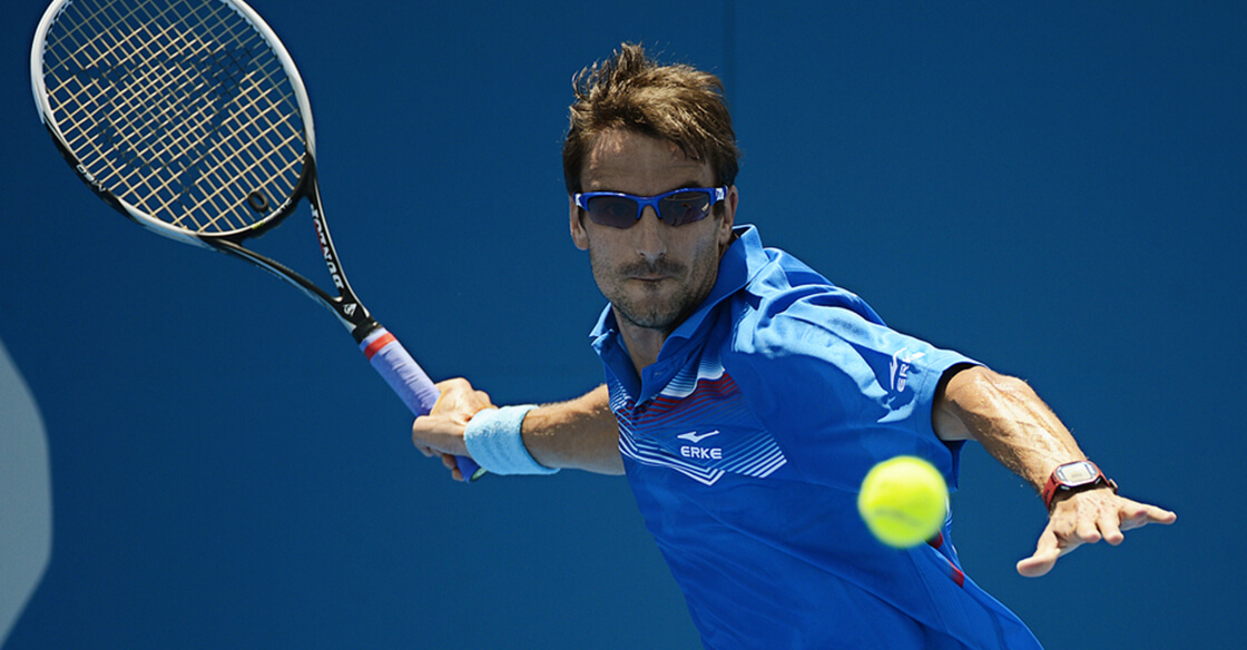 Sports Eyeglasses - Man playing tennis